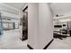 Modern entry hall with tile floors and a view into the living area at 5 Highland Cove Ln, Henderson, NV 89011