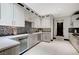 Kitchen with stainless steel appliances and wine cooler at 5 Highland Cove Ln, Henderson, NV 89011