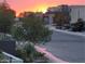 Stunning sunset view over a modern neighborhood at 5 Highland Cove Ln, Henderson, NV 89011