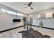 Bright home office featuring a modern fireplace and hardwood floors at 5 Highland Cove Ln, Henderson, NV 89011