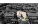 Aerial view of house with pool and spa in a residential neighborhood at 528 Copper View St, Henderson, NV 89052