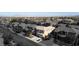 Aerial view of a two story house with a three car garage and palm trees in a residential neighborhood at 528 Copper View St, Henderson, NV 89052