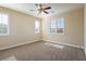 Bedroom with carpet, ceiling fan and two windows with shutters at 528 Copper View St, Henderson, NV 89052