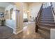 Elegant entryway with tiled floors and grand staircase at 528 Copper View St, Henderson, NV 89052