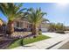 Two-story house with three-car garage and palm trees at 528 Copper View St, Henderson, NV 89052