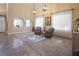 Spacious living area with high ceilings and large windows at 528 Copper View St, Henderson, NV 89052