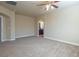 Main bedroom with carpet, ceiling fan and ensuite bathroom at 528 Copper View St, Henderson, NV 89052