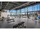 Well-equipped gym featuring modern equipment and large windows, offering an ideal workout environment at 5436 Succulent Rose Dr, Las Vegas, NV 89135