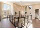 Hallway with contemporary railings overlooking the lower level of the home with lots of natural light at 5436 Succulent Rose Dr, Las Vegas, NV 89135