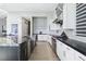 Spacious open kitchen with stainless steel appliances, a center island, and a seamless design leading to the dining area at 5436 Succulent Rose Dr, Las Vegas, NV 89135