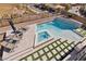 Aerial view of a pool and spa highlighting the modern design and outdoor living space at 5436 Succulent Rose Dr, Las Vegas, NV 89135