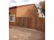 Wooden fence and gravel area behind the house at 5459 Cactus Thorn Ave, Las Vegas, NV 89118