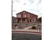 Two-story house with stucco siding and landscaped front yard at 5459 Cactus Thorn Ave, Las Vegas, NV 89118