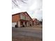 Row of two story homes with orange exterior at 5459 Cactus Thorn Ave, Las Vegas, NV 89118