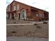 Two-story house with stucco siding, arched windows, and a patio at 5459 Cactus Thorn Ave, Las Vegas, NV 89118