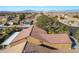 Aerial view of a single-Gathering home showing the tile roof and community in the background at 551 Morning Mauve Ave, Las Vegas, NV 89183