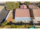 Aerial view of a desert home in a residential neighborhood showing the covered patio and minimal backyard at 551 Morning Mauve Ave, Las Vegas, NV 89183