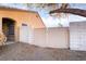 Private backyard area featuring a secure gate and well-maintained gravel landscaping for low maintenance at 551 Morning Mauve Ave, Las Vegas, NV 89183