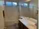 Clean bathroom with a shower/tub combo and double vanity at 551 Morning Mauve Ave, Las Vegas, NV 89183