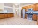 Bright kitchen equipped with stainless steel appliances and granite countertops at 551 Morning Mauve Ave, Las Vegas, NV 89183