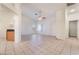 Bright living room featuring neutral colors and tile flooring at 551 Morning Mauve Ave, Las Vegas, NV 89183