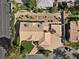 Aerial view of home showing desert landscaping, backyard space, and proximity to neighborhood streets at 5555 W Desert Inn Rd, Las Vegas, NV 89146