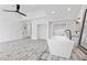 Modern bathroom featuring a soaking tub and vanity at 5555 W Desert Inn Rd, Las Vegas, NV 89146