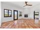 Cozy living room featuring a modern fireplace and backyard access at 5555 W Desert Inn Rd, Las Vegas, NV 89146