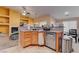 Modern kitchen features stainless steel appliances and an island at 5600 Nimes Ave, Las Vegas, NV 89141