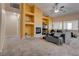 Spacious living room with fireplace and built-in shelving at 5600 Nimes Ave, Las Vegas, NV 89141