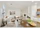 Virtually staged dining area with a round table and modern chairs at 5725 Copper Sun Ct, North Las Vegas, NV 89031