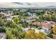 An aerial view showcasing the home's expansive property and surrounding neighborhood at 5895 S Gateway Rd, Las Vegas, NV 89120