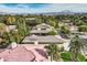 View of the house from the back, highlighting the backyard and pool area at 5895 S Gateway Rd, Las Vegas, NV 89120