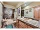 Bathroom boasts slate tile and a neutral vanity at 5895 S Gateway Rd, Las Vegas, NV 89120