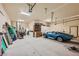 Spacious garage with overhead storage and room for a car at 5895 S Gateway Rd, Las Vegas, NV 89120