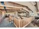 Spacious loft area with wood beams and built-in shelving at 5895 S Gateway Rd, Las Vegas, NV 89120