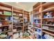 Well-organized pantry with ample shelving for storage at 5895 S Gateway Rd, Las Vegas, NV 89120