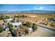 Aerial view of a house nestled in a desert landscape with mountains in the background at 5981 Doubletree Rd, Pahrump, NV 89061