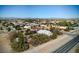 Aerial view of a house and surrounding neighborhood, showcasing the property's location and landscape at 5981 Doubletree Rd, Pahrump, NV 89061