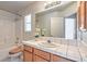 Clean bathroom with wood vanity and tiled floor at 5981 Doubletree Rd, Pahrump, NV 89061