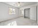 Bedroom with mirrored closet doors and ceiling fan at 5981 Doubletree Rd, Pahrump, NV 89061