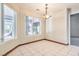 Bright breakfast nook with tile flooring and large windows at 5981 Doubletree Rd, Pahrump, NV 89061