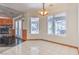 Bright dining area with tile floors and access to backyard at 5981 Doubletree Rd, Pahrump, NV 89061