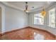 Dining room with hardwood floors, built in cabinetry, and large windows at 5981 Doubletree Rd, Pahrump, NV 89061