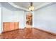 Dining room with hardwood floors, built-in cabinetry, and kitchen view at 5981 Doubletree Rd, Pahrump, NV 89061