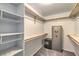 Large walk-in closet with shelving and safe at 5981 Doubletree Rd, Pahrump, NV 89061