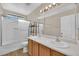 Bathroom with double sinks, shower/tub combo at 6145 Sydney Bay Ct, North Las Vegas, NV 89081