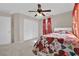 Bedroom with ceiling fan and neutral color scheme at 6145 Sydney Bay Ct, North Las Vegas, NV 89081