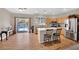 Kitchen with island, stainless steel appliances, and pool view at 6145 Sydney Bay Ct, North Las Vegas, NV 89081