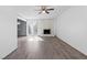 Living room with stone fireplace and sliding doors to patio at 6223 Foothill Blvd, Las Vegas, NV 89118